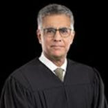 Headshot of Sanjay Tailor. 