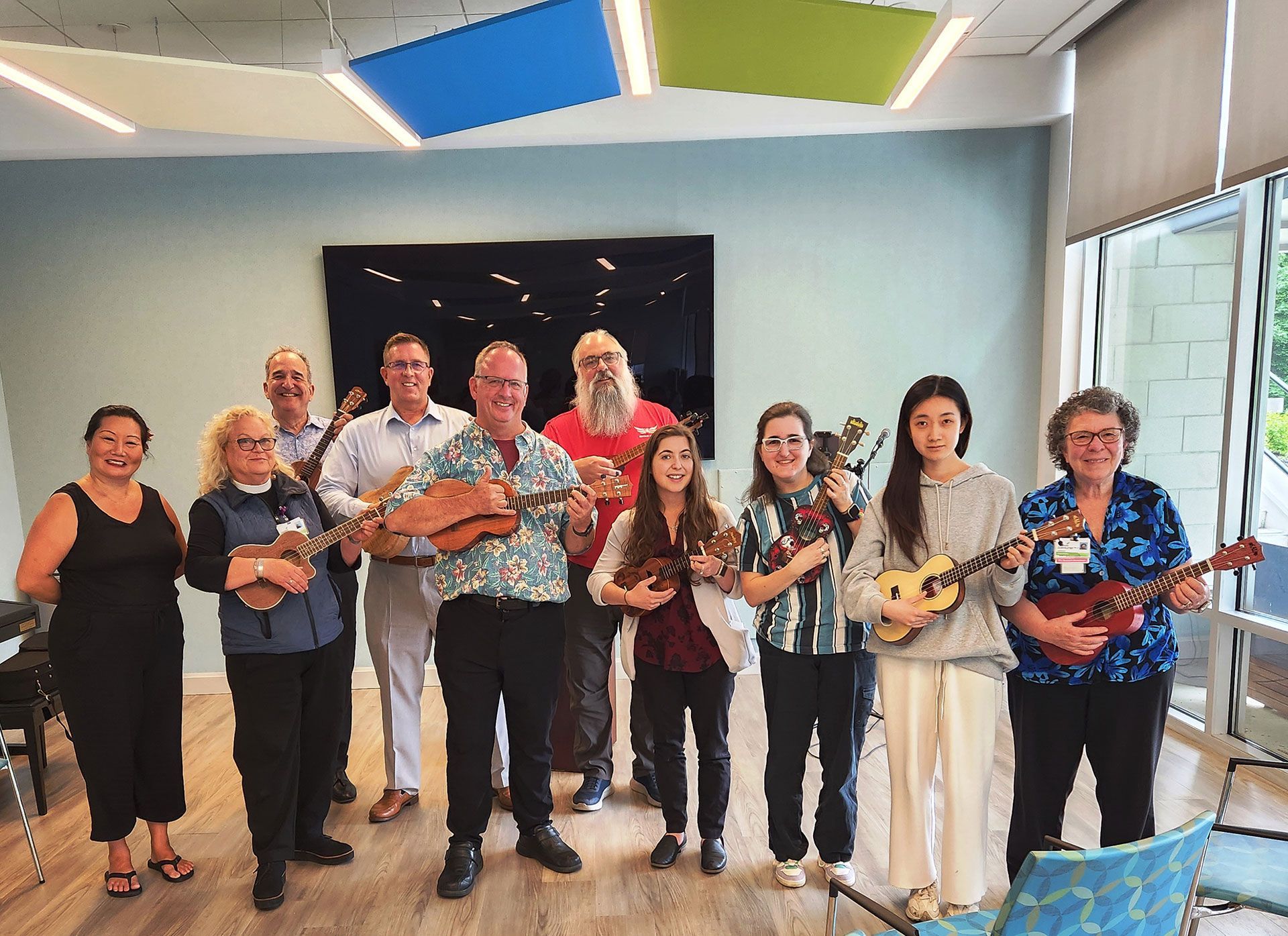Wartburg and IMNF staff and students join Vania, Jason and David Blake to launch new Ukulele program