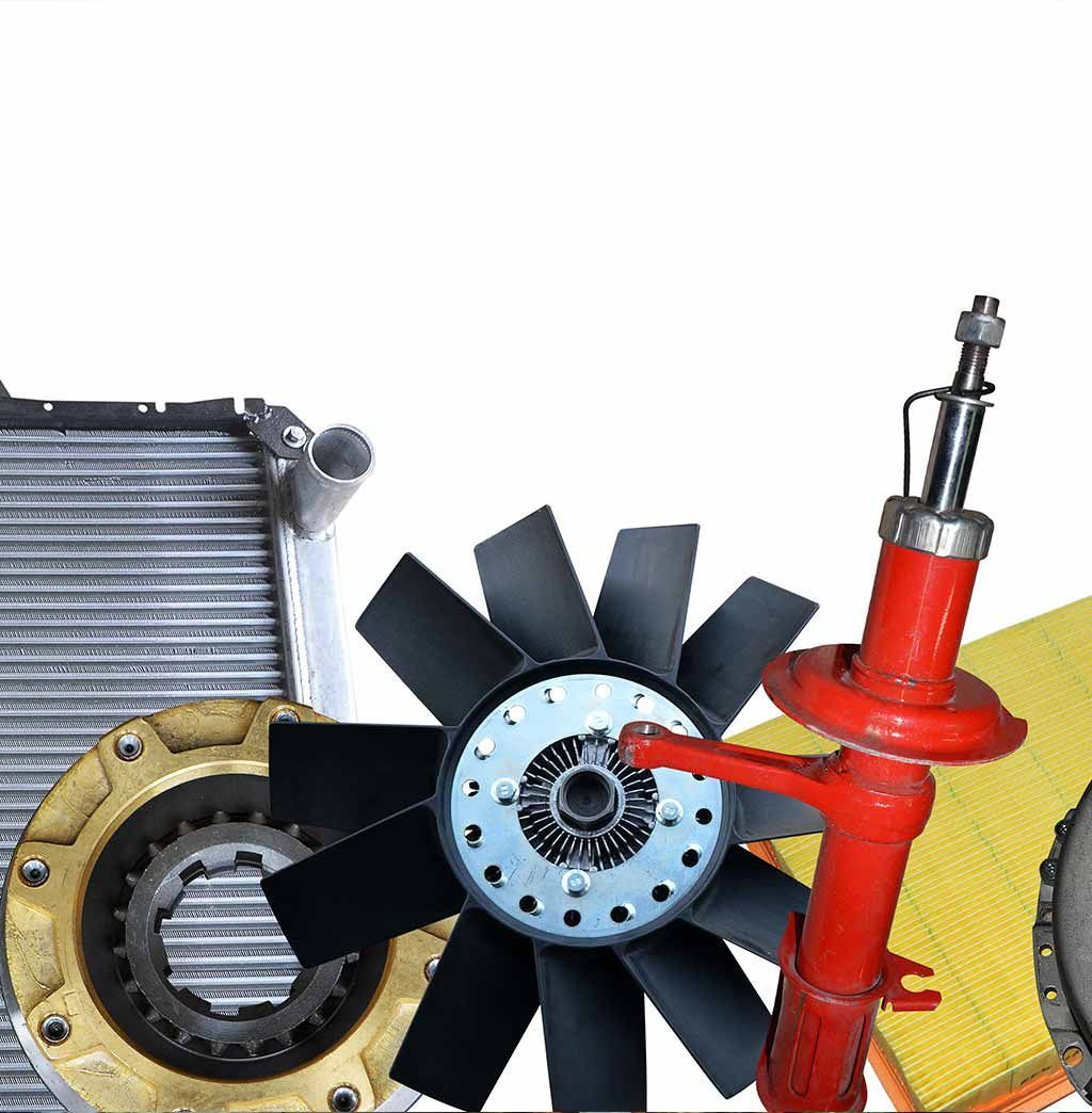 A group of car parts including a radiator and a fan