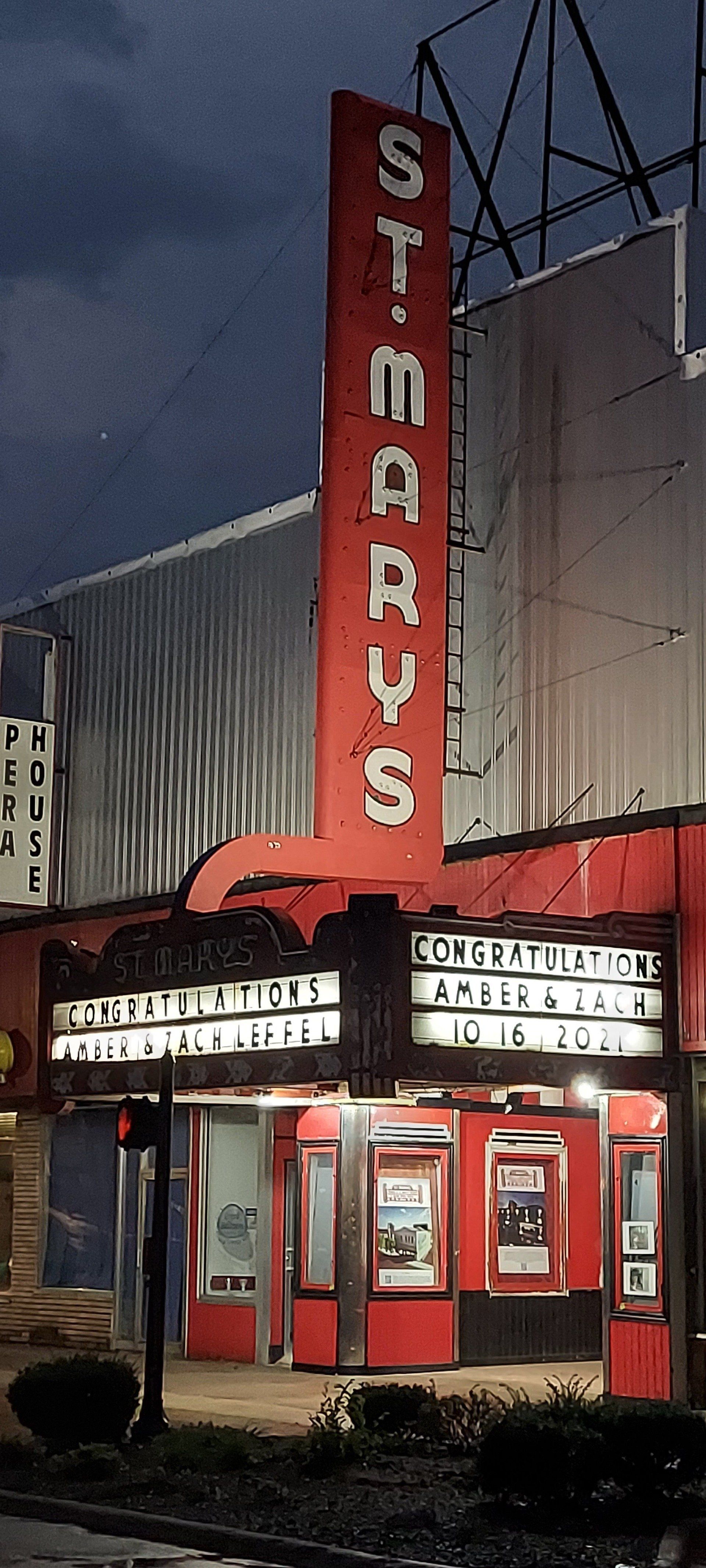 A large red sign that says ' steakhouse ' on it