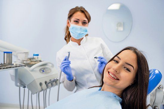 Woman with front tooth gap, dental bonding services in Cicero, IL