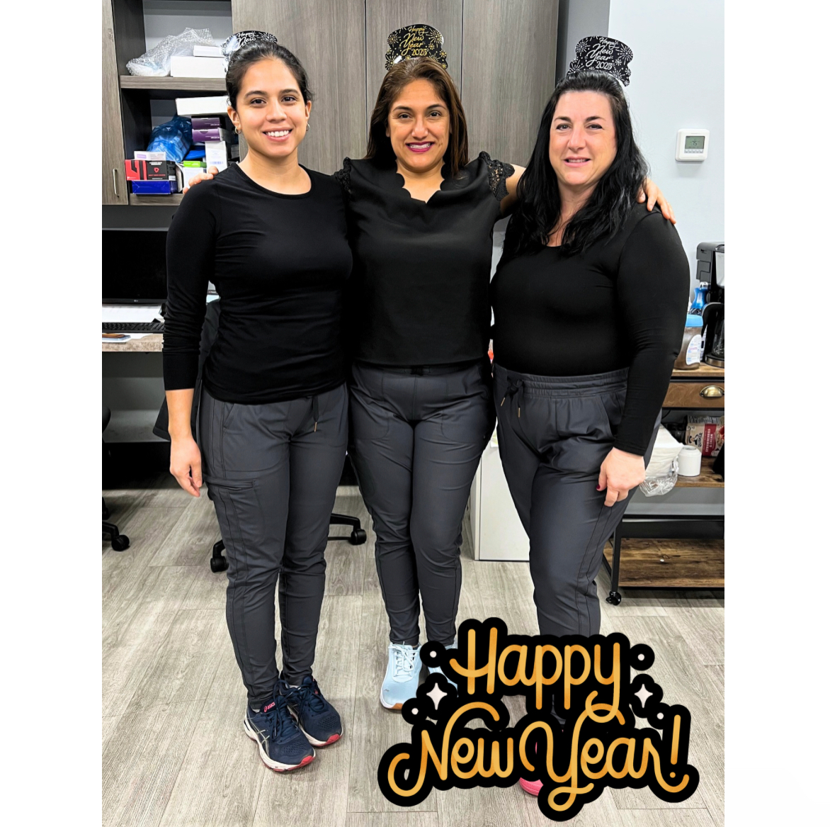 staff photo smiling new year