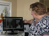 Neck Pain Relief - Dr Checking The X-ray in Jasper, AL