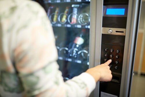 Person Using Vending Machine — Vending in Berrimah, NT