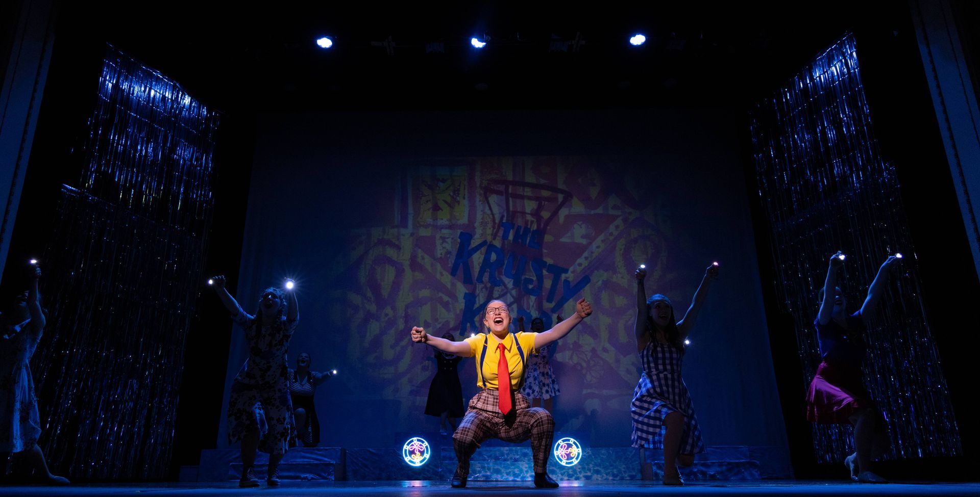 Young performer on stage at Moss Performing Arts Academy at Moss Performing Arts Academy near Fort W