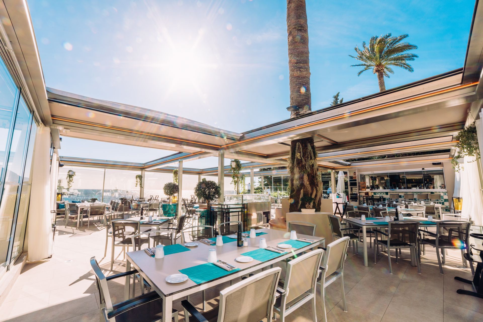 There are many tables and chairs in the restaurant - Freehold, NJ - Awning Design Inc