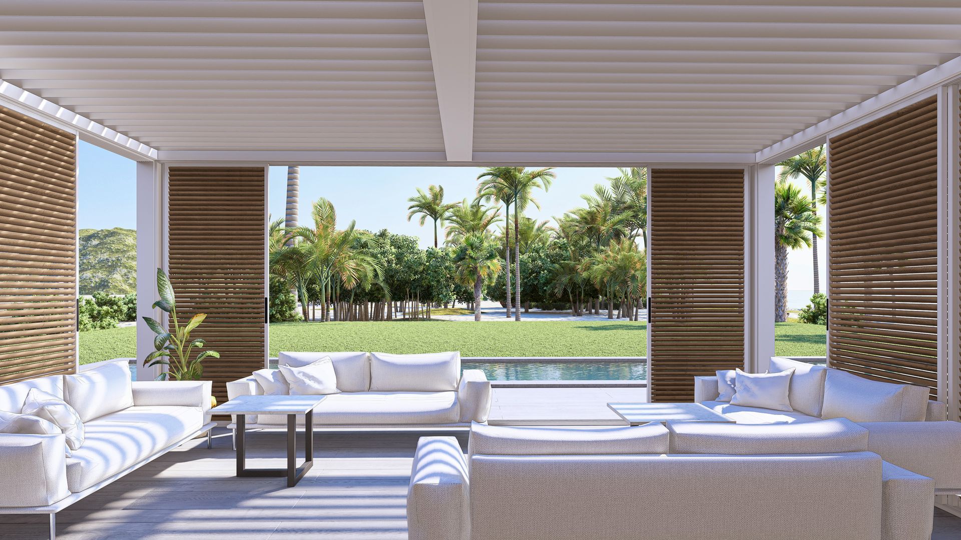 A living room with white couches and a table with a view of a lush green field - Freehold, NJ - Awning Design Inc