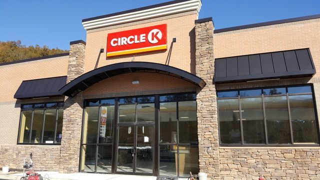 A circle k store with a red sign above the door - Freehold, NJ - Awning Design Inc