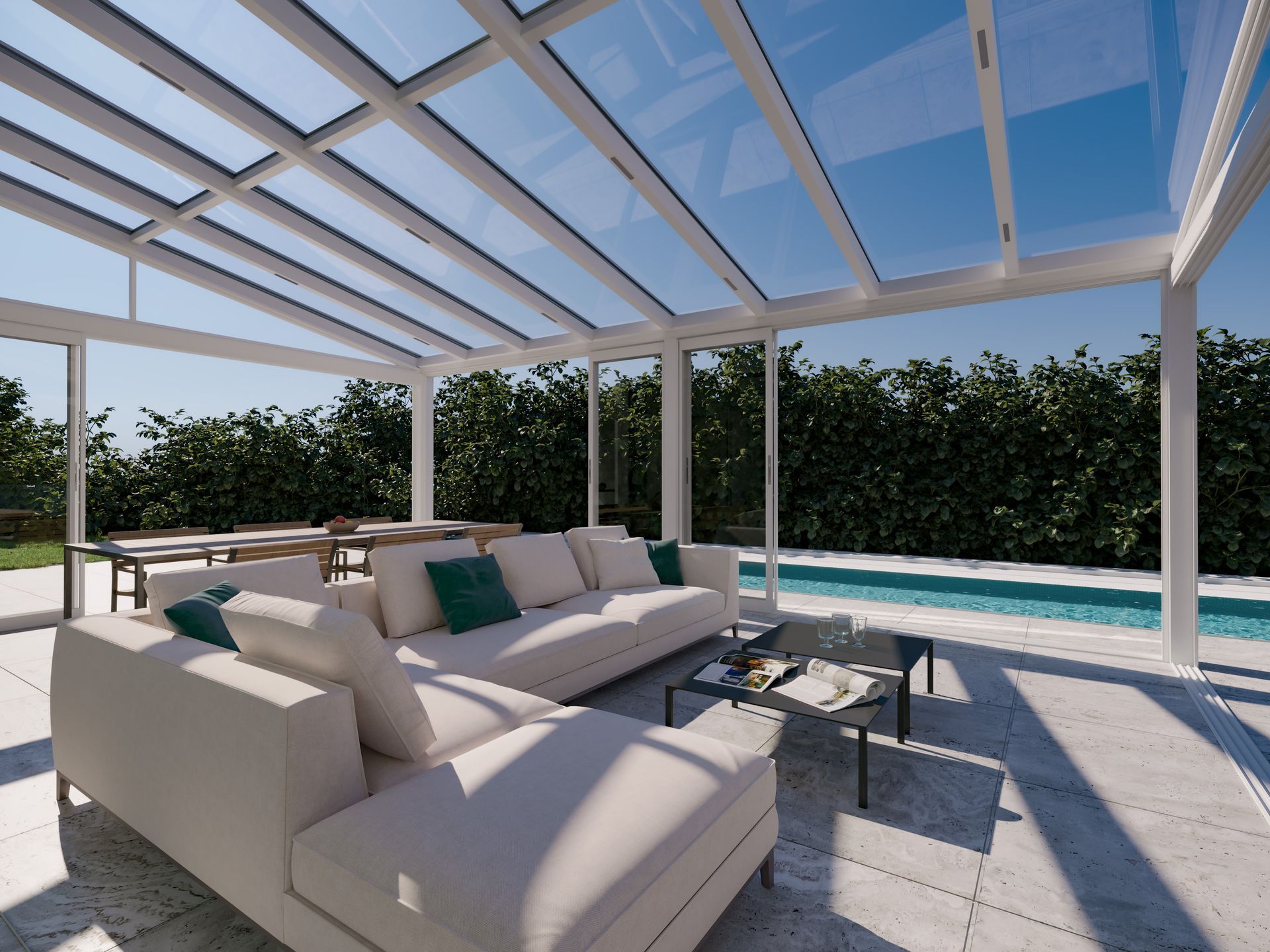 A living room with a couch and a table under a glass roof - Freehold, NJ - Awning Design Inc