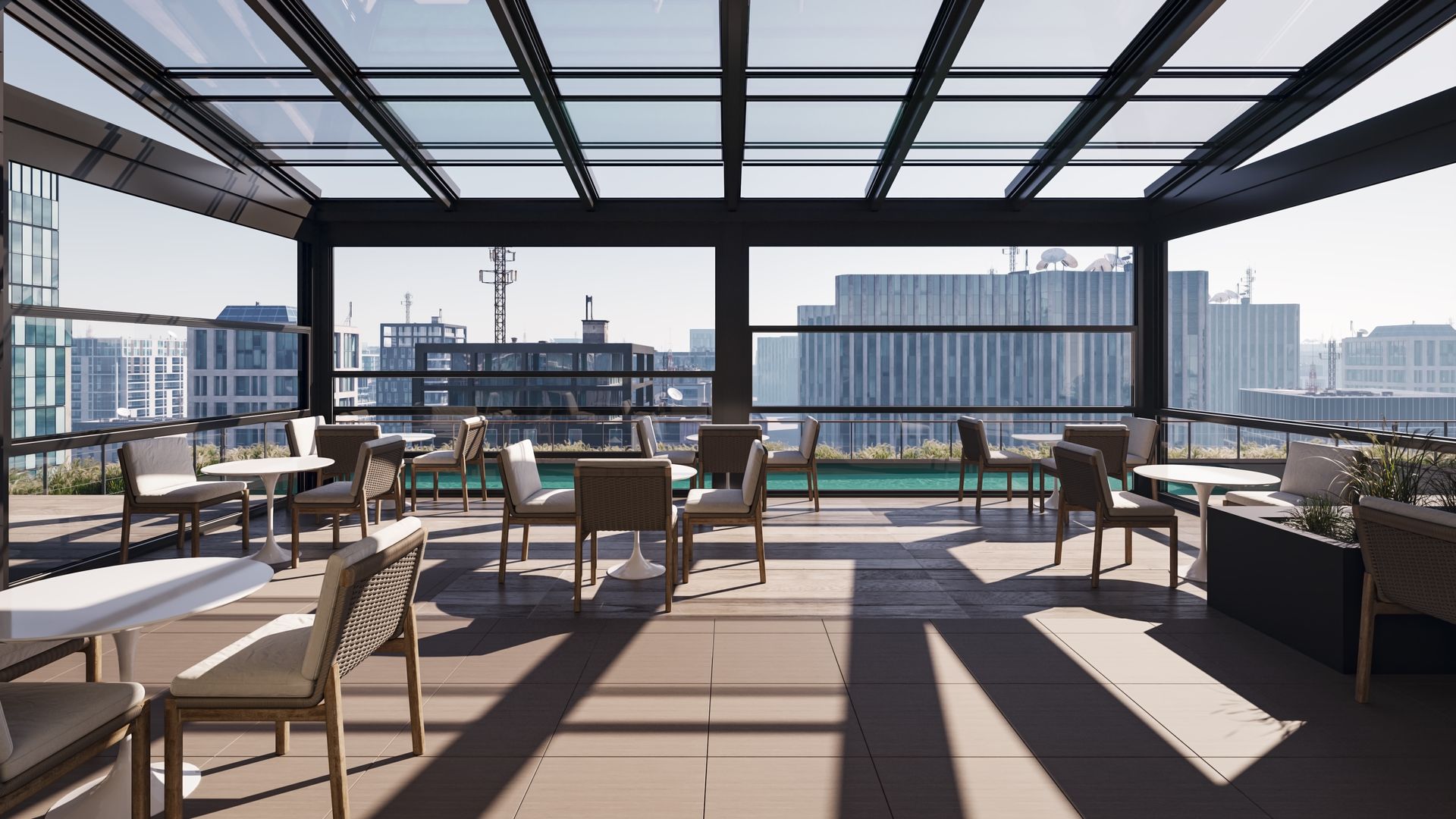 A rooftop patio with tables and chairs and a pool two - Freehold, NJ - Awning Design Inc