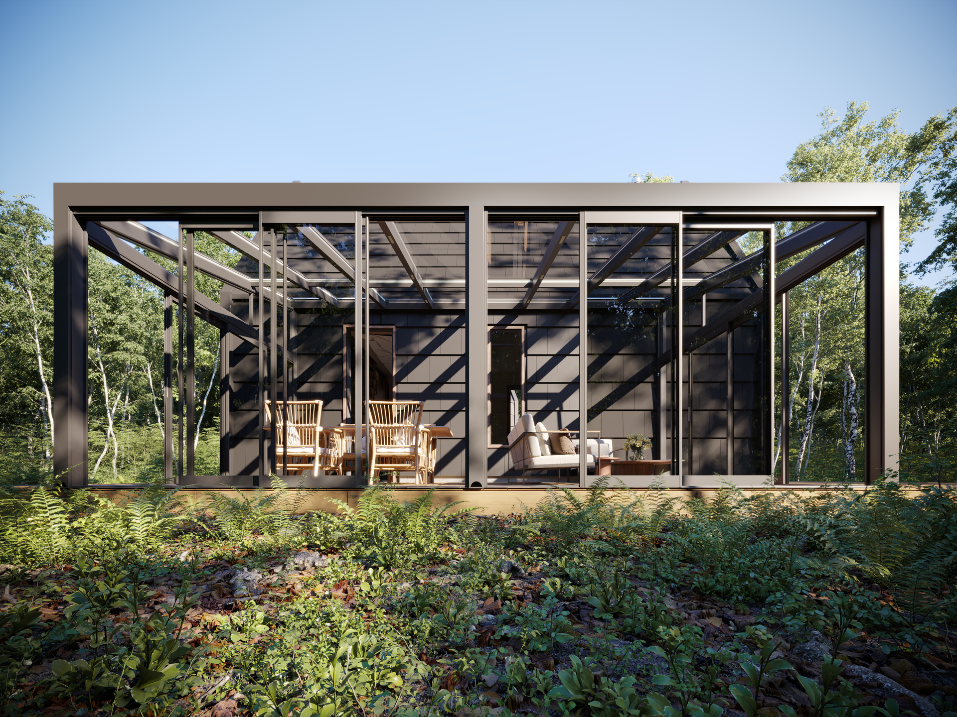 A modern house with a lot of windows is surrounded by trees - Freehold, NJ - Awning Design Inc