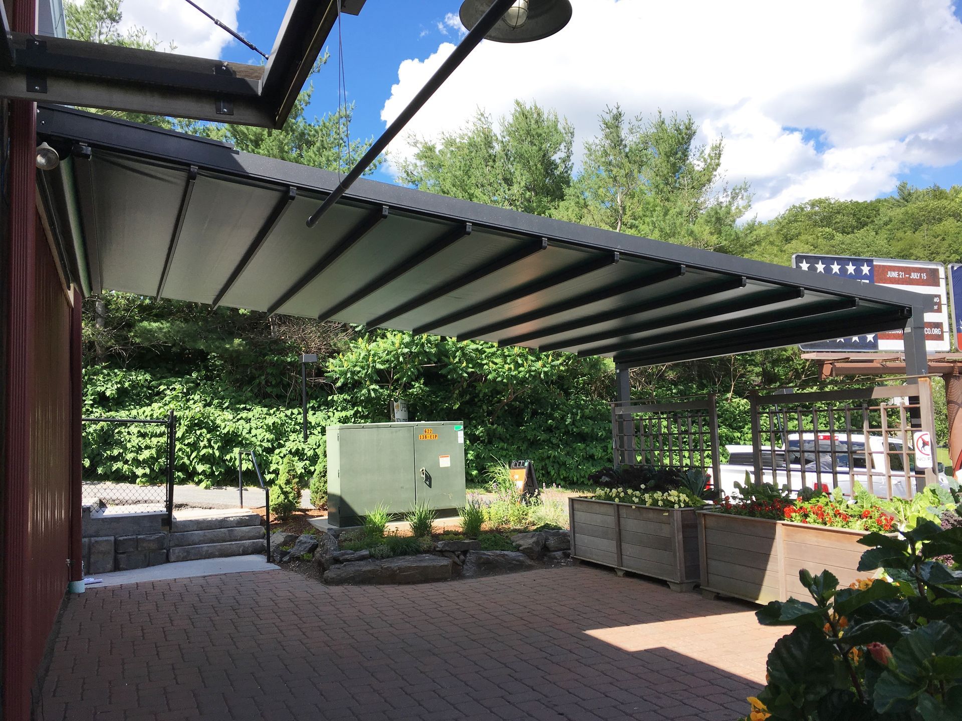 A patio with a canopy over it - Freehold, NJ - Awning Design Inc