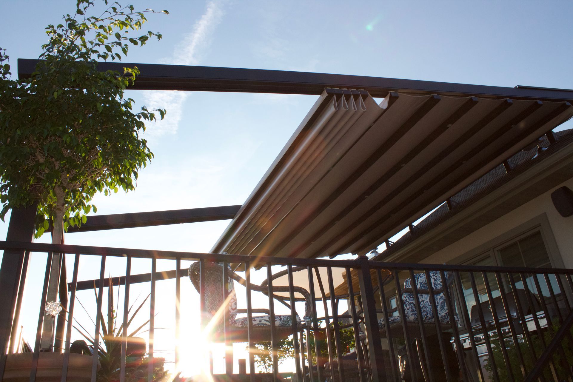 The sun is shining through the roof of a building - Freehold, NJ - Awning Design Inc