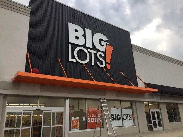 A store front with a sign that says big lots - Freehold, NJ - Awning Design Inc