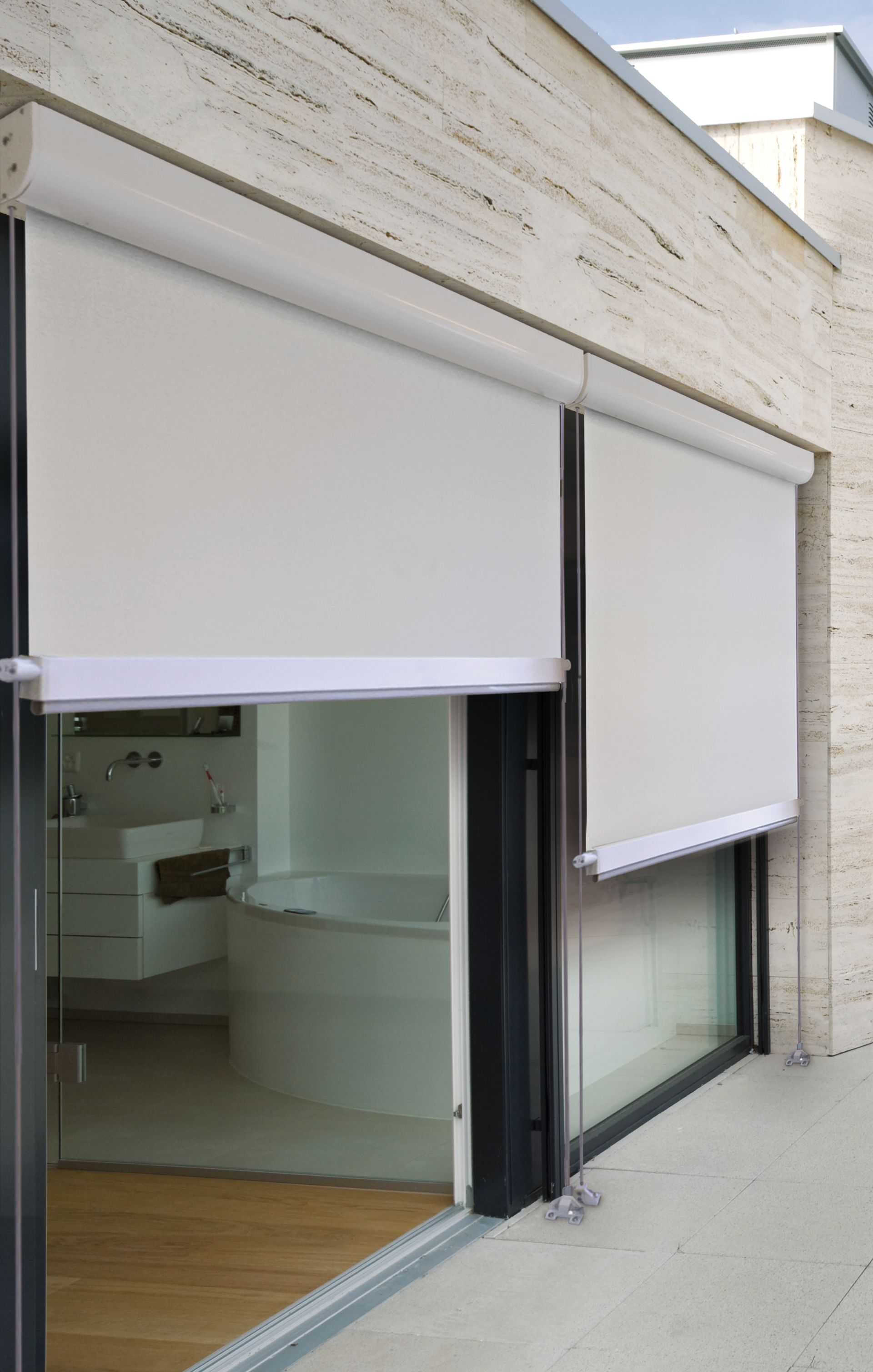 A sliding glass door with white blinds on it - Freehold, NJ - Awning Design Inc