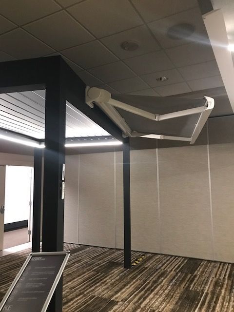 An empty room with a white awning on the ceiling - Freehold, NJ - Awning Design Inc