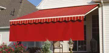 A red awning is on the side of a white house - Freehold, NJ - Awning Design Inc