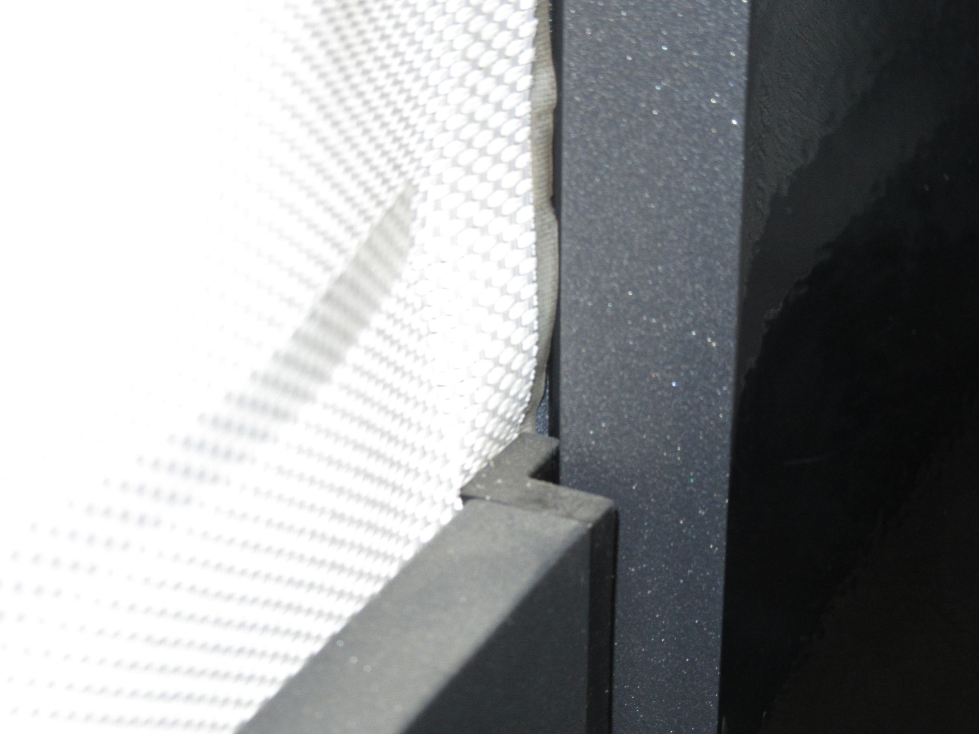 A close up of a metal railing with a white cloth on it - Freehold, NJ - Awning Design Inc