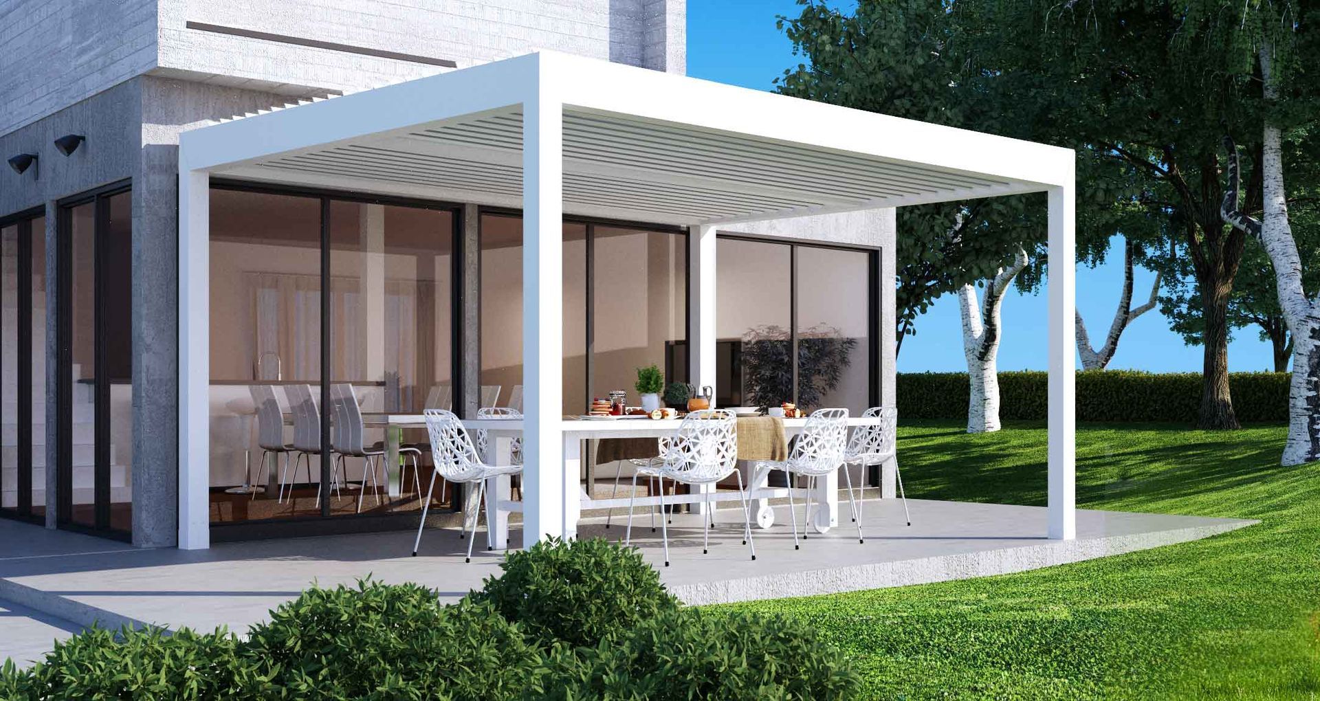 A white pergola is sitting on top of a patio next to a house - Freehold, NJ - Awning Design Inc
