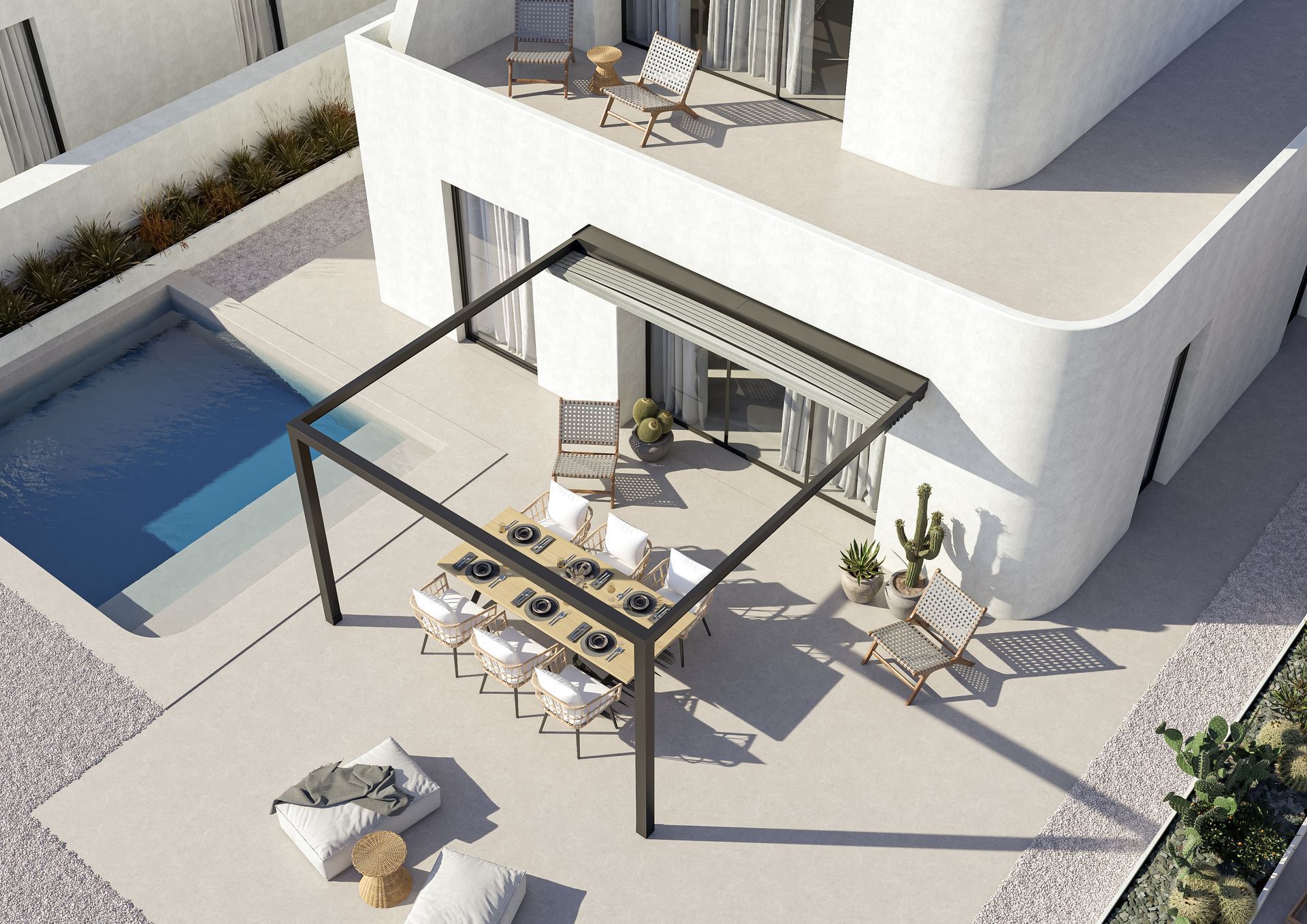 An aerial view of a house with a patio and a swimming pool - Freehold, NJ - Awning Design Inc