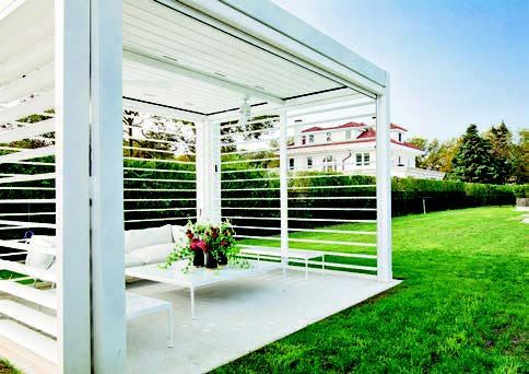 A white pergola with a couch - Freehold, NJ - Awning Design Inc