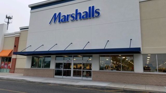 The front of a marshalls store with a blue awning - Freehold, NJ - Awning Design Inc