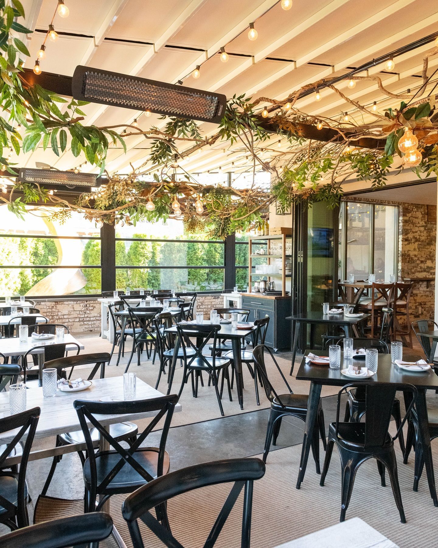 Louvered Pergola commercial awnings over restaurant patio for curb appeal