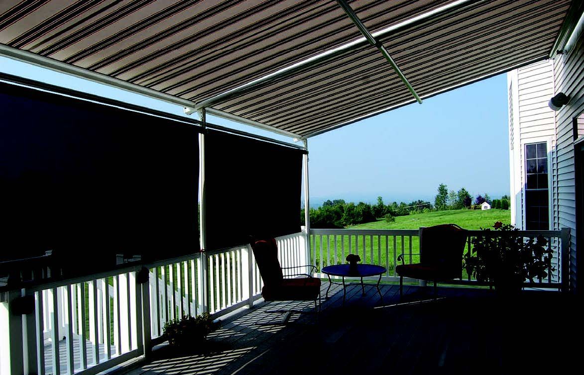 A porch with a canopy over it and a view of a field - Freehold, NJ - Awning Design Inc