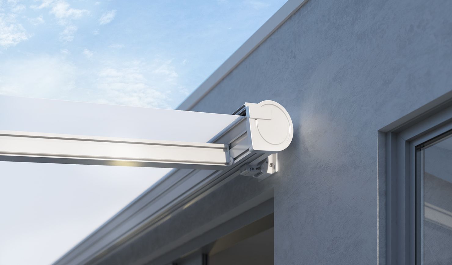 A white awning is attached to the side of a building - Freehold, NJ - Awning Design Inc