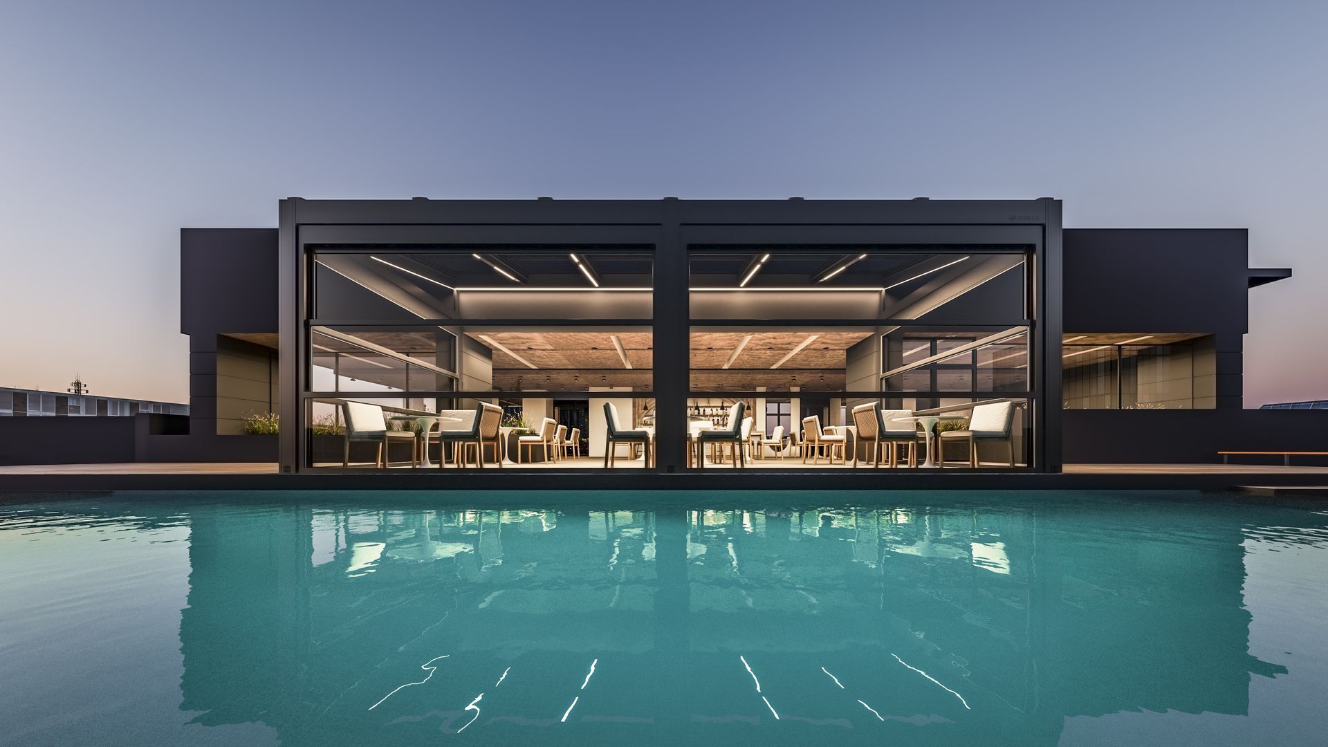 A large building with a swimming pool in front of it - Freehold, NJ - Awning Design Inc