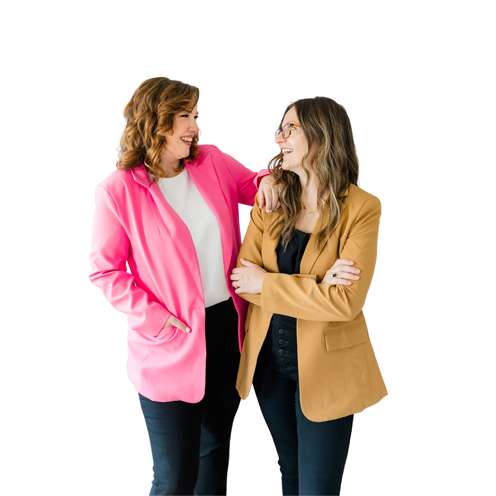 Two women are standing next to each other with their arms crossed and smiling.
