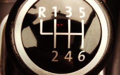 A close up of a car shifter with the numbers r135 lh 246