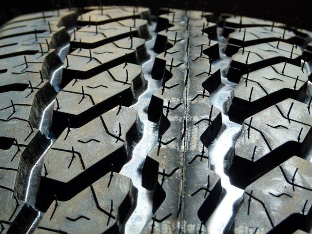 A close up of a tire with a lot of holes in it