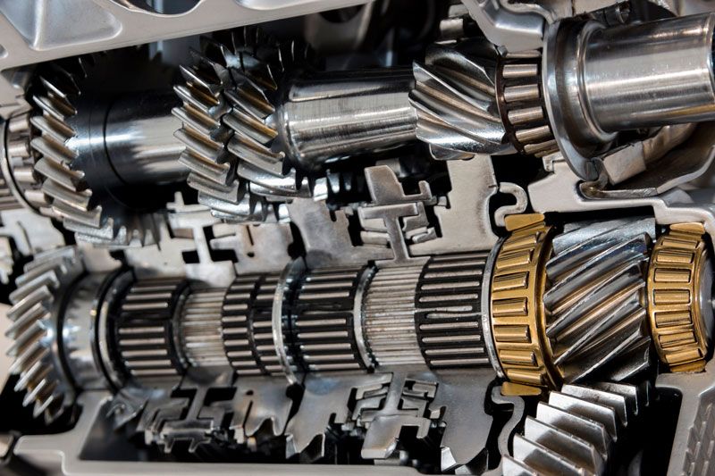 A close up of a gearbox with a lot of gears