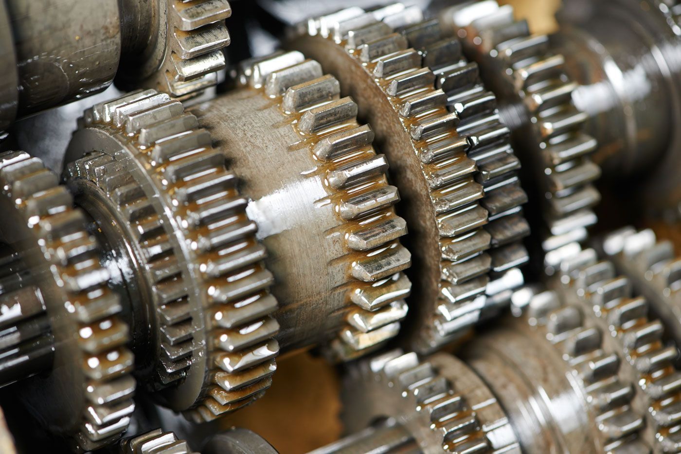 A close up of a row of gears in a machine.