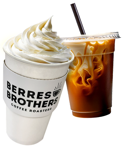 A white paper cup with whipped cream next to an iced coffee, both from Berres Brothers Coffee Roasters.
