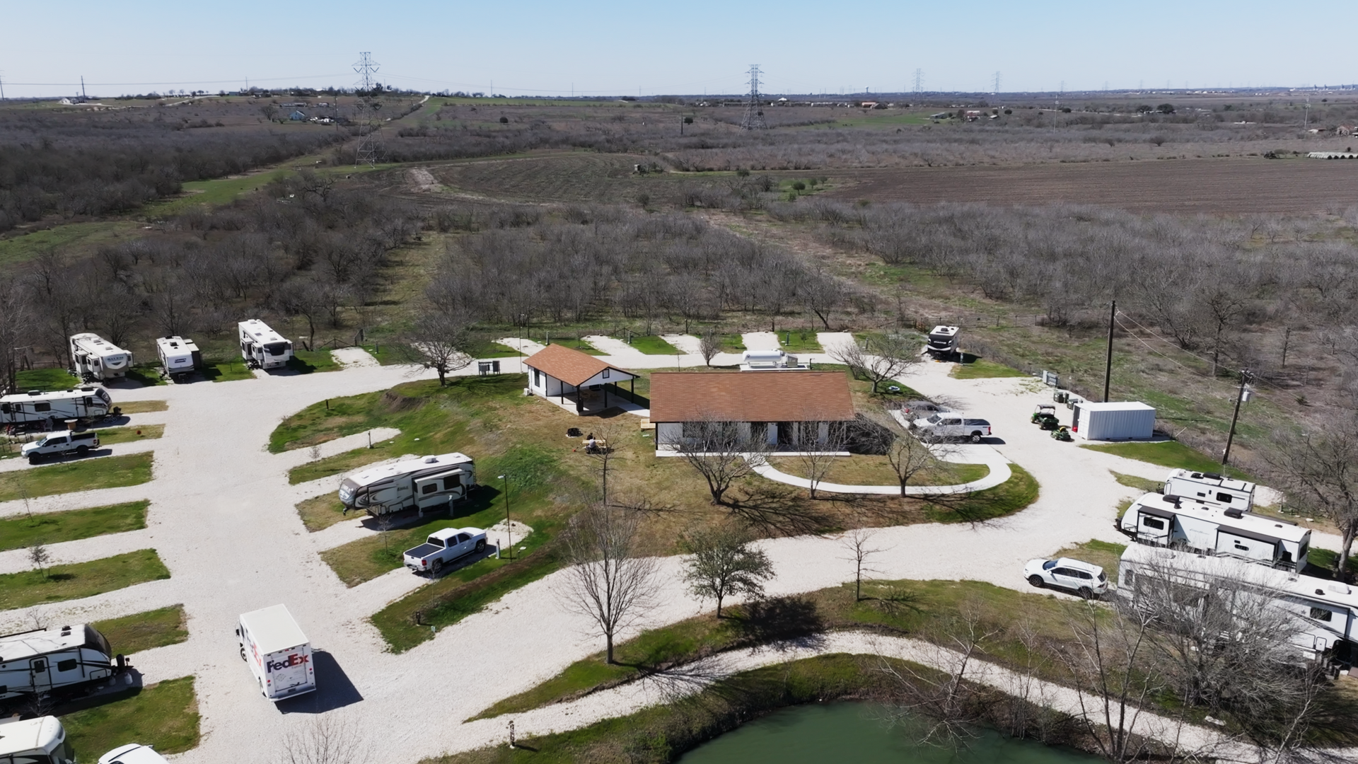 Happy Camper coffee mug on a pile of logs