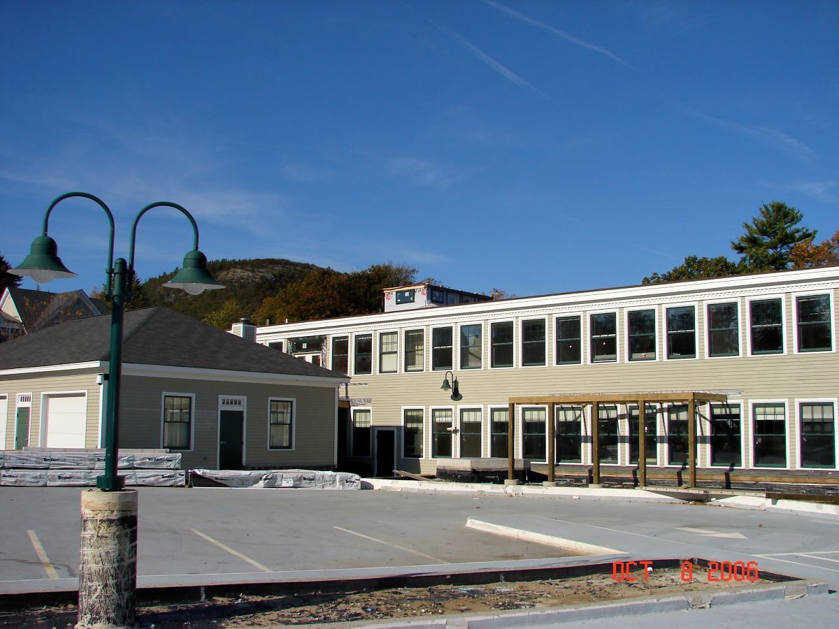 A large building with a lot of windows is under construction