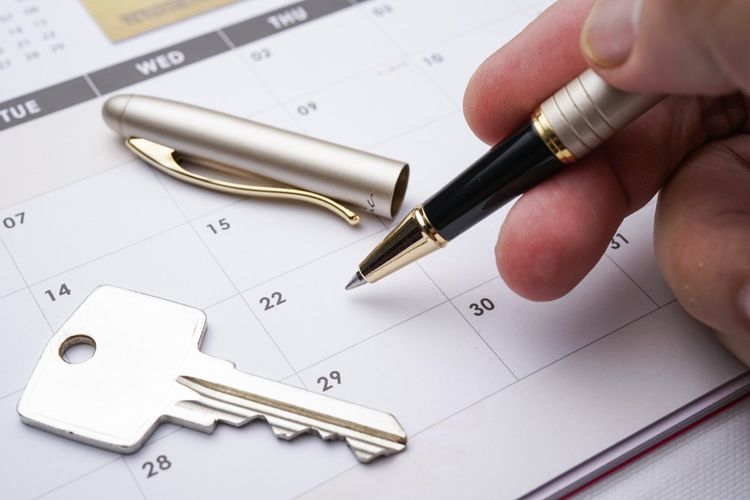 Man Marking Date on Calendar — Insurance Services in Rockhampton, QLD