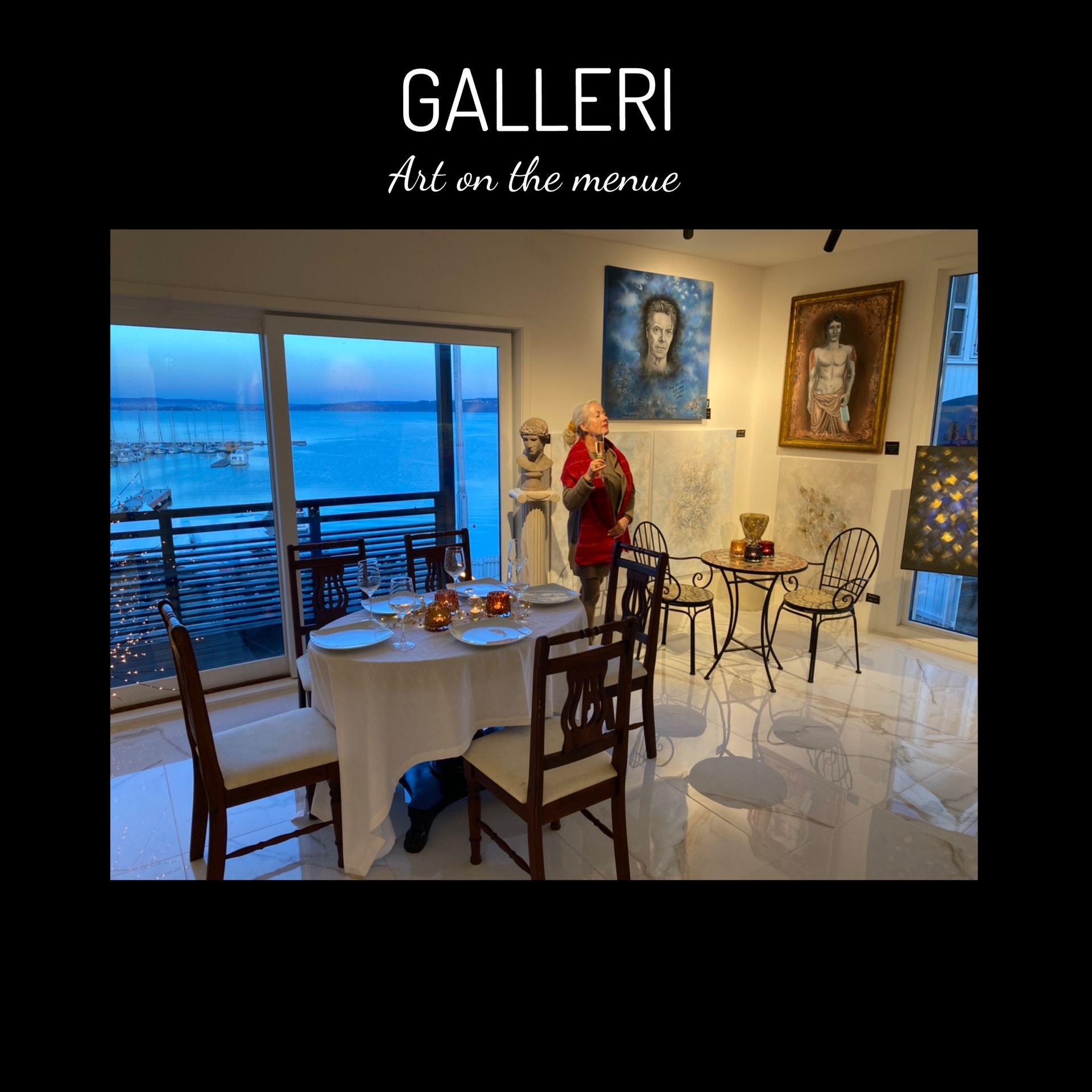 A man is standing in a room with a table and chairs.