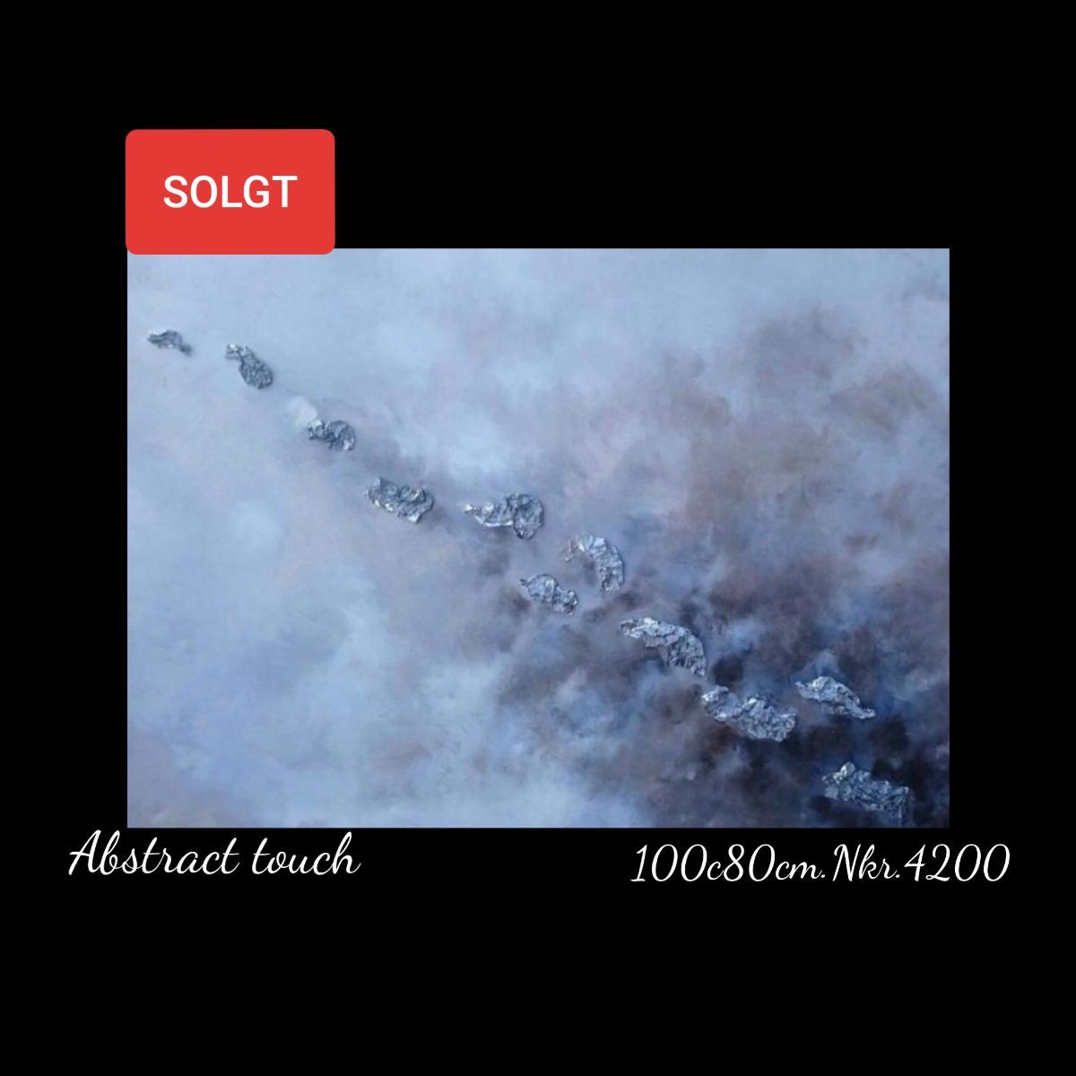 An aerial view of smoke coming out of a volcano