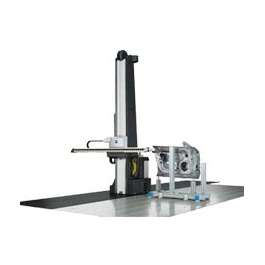 A machine is sitting on top of a table with a piece of metal on it.