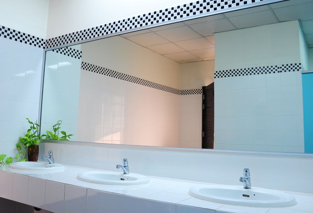 A Bathroom with Two Sinks and A Large Mirror — Colour Splash in Hunter Valley, NSW