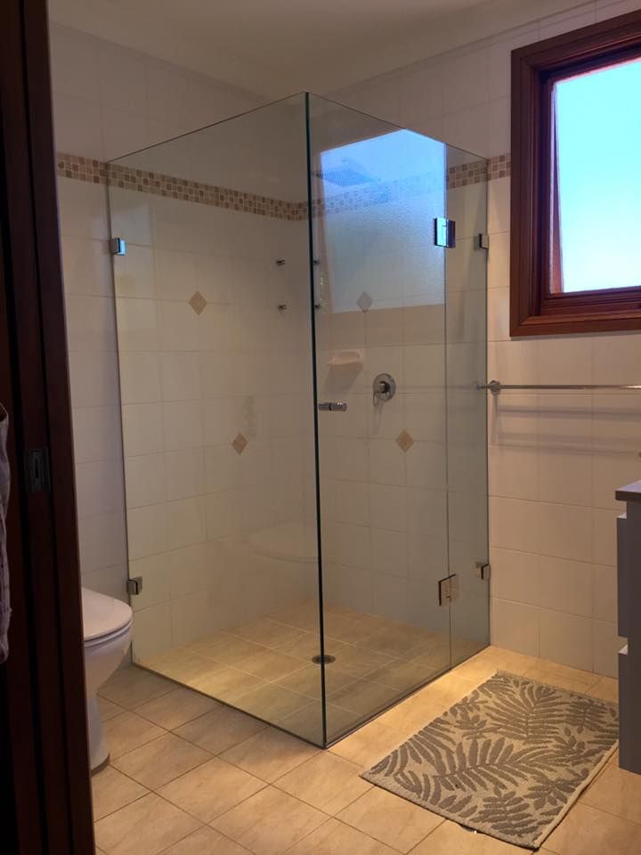 A Bathroom with A Walk in Shower and A Toilet — Colour Splash in Mayfield, NSW