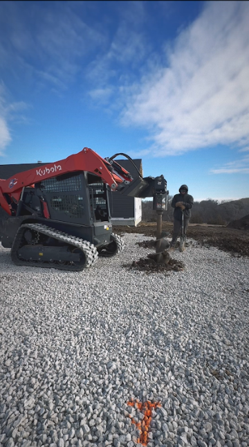 A bulldozer is moving dirt on a construction site.