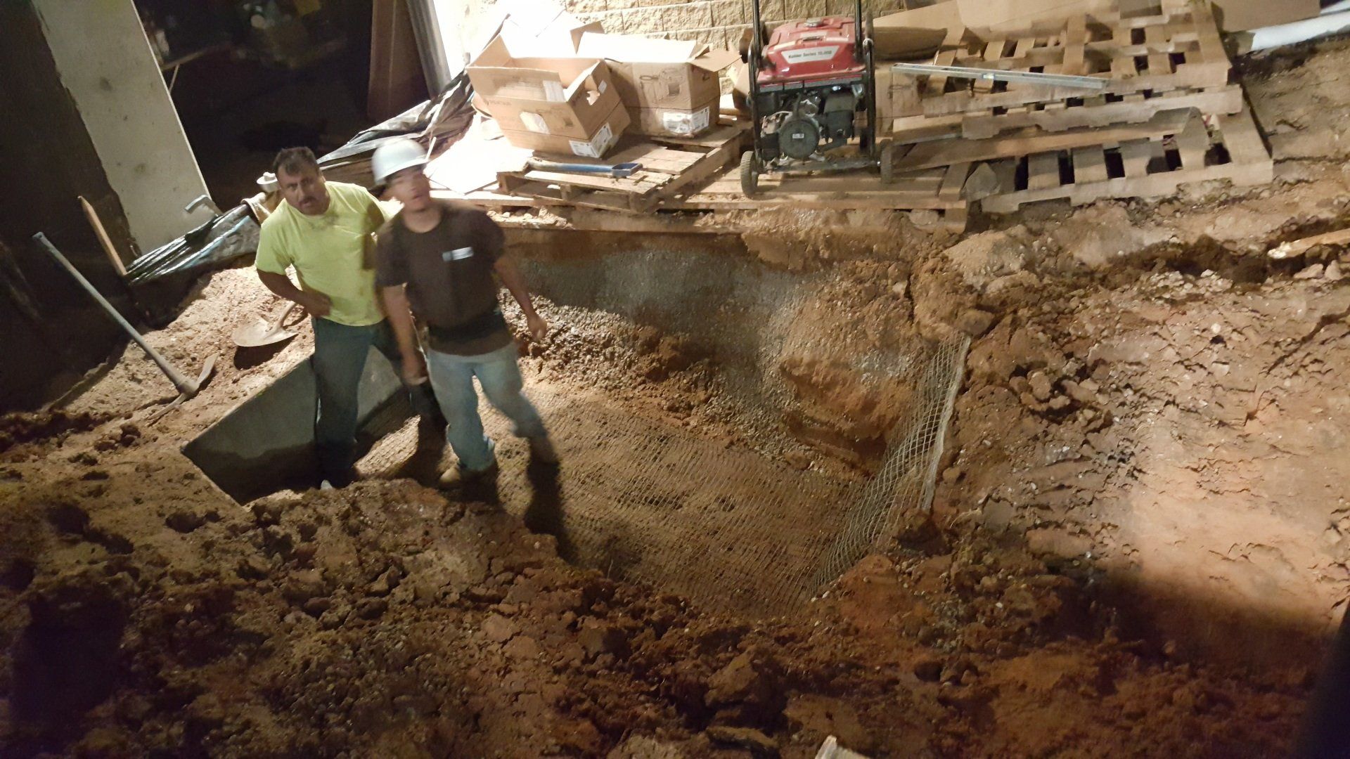 Wall Panels — 2 Men Digging Hole in Wichita, KS