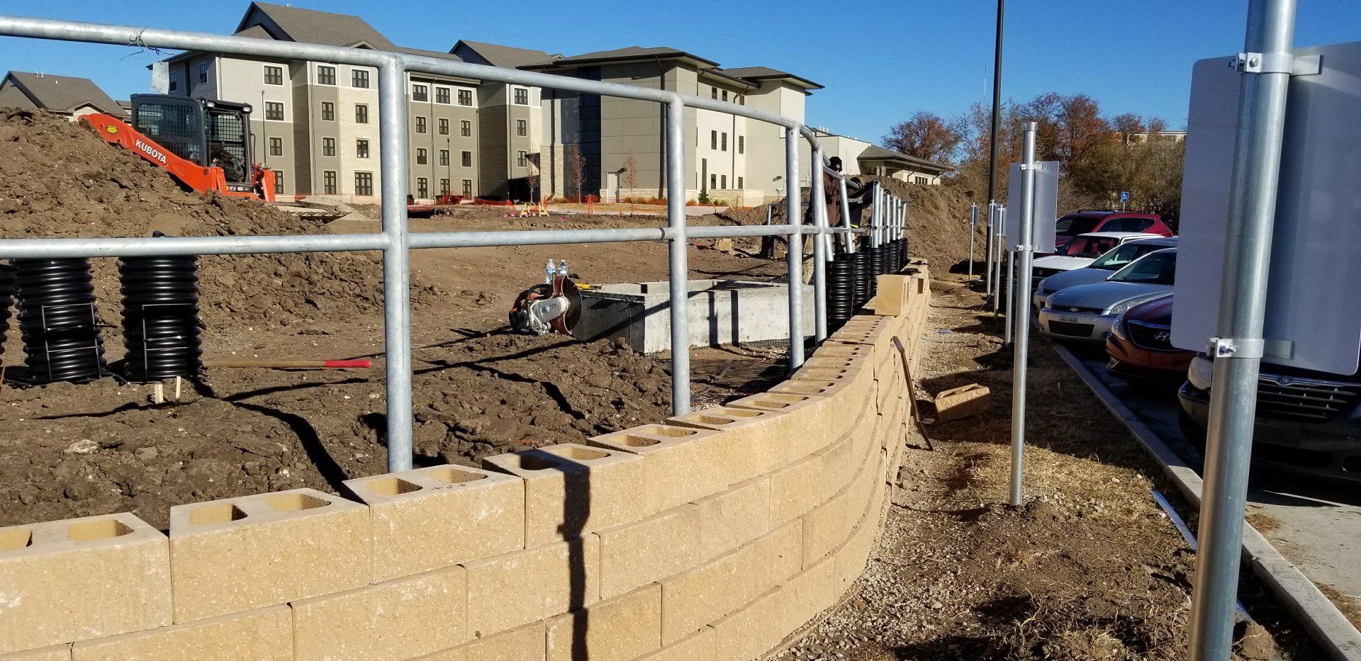 Hardscaping — Retaining Wall With Railings in Wichita, KS