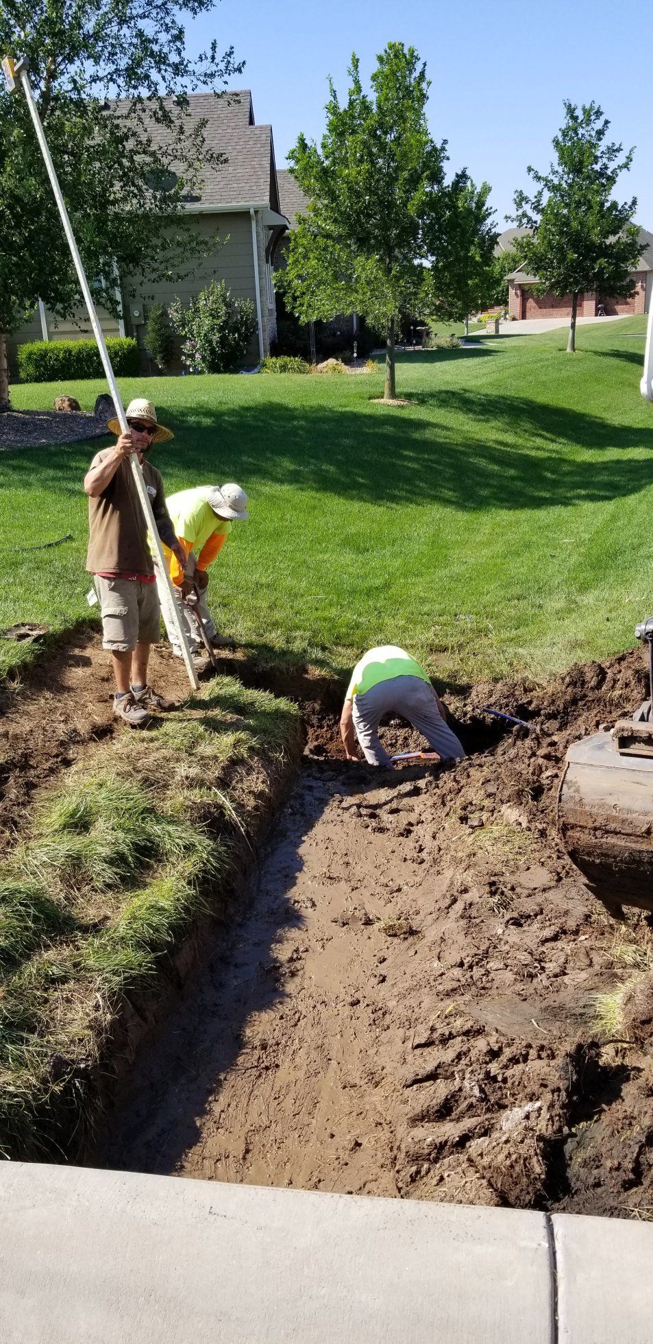 Drainage System — Men Digging Land For Drainage in Wichita, KS