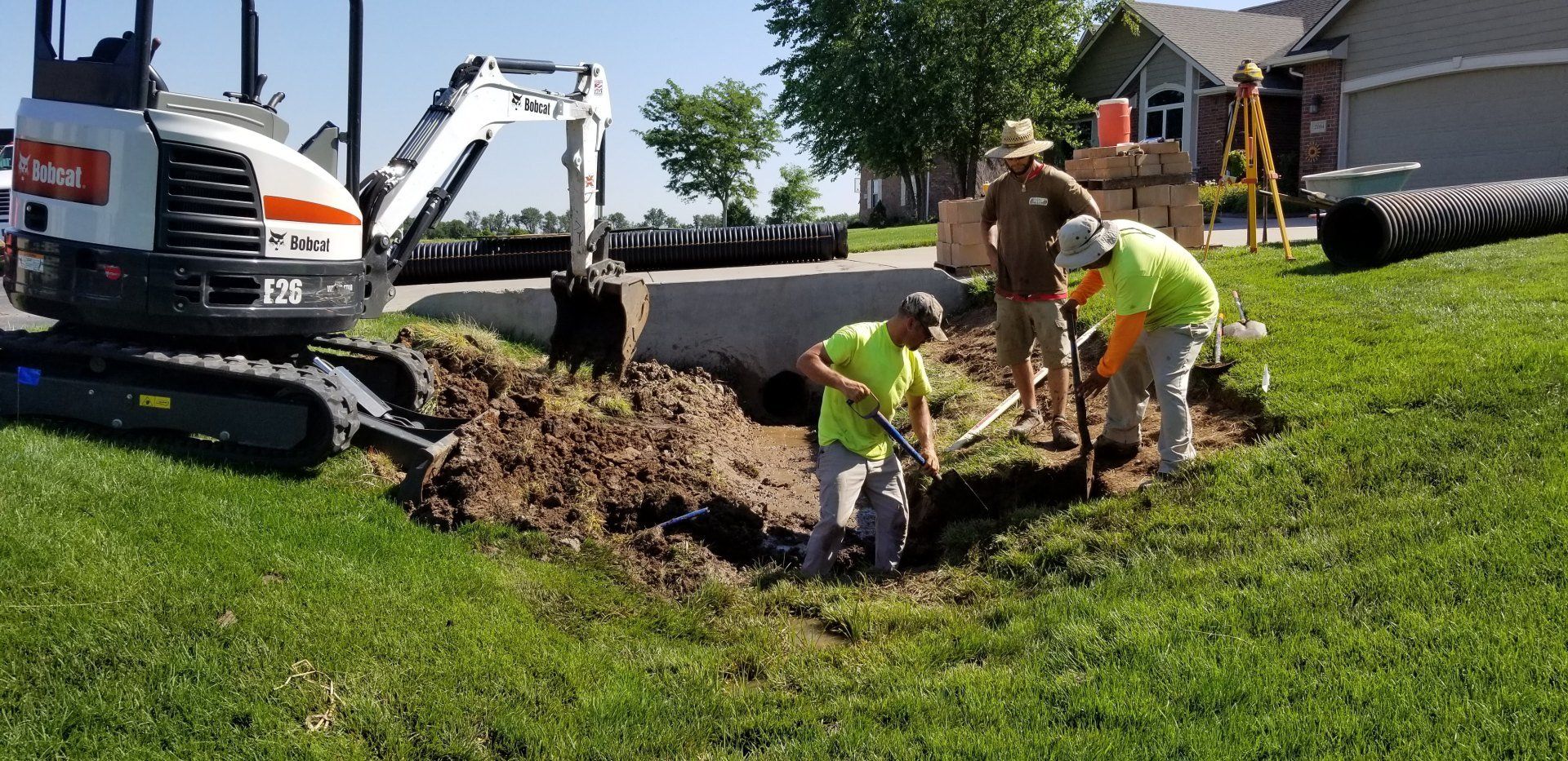 Better Drainage — Men Digging Land For Drainage in Wichita, KS