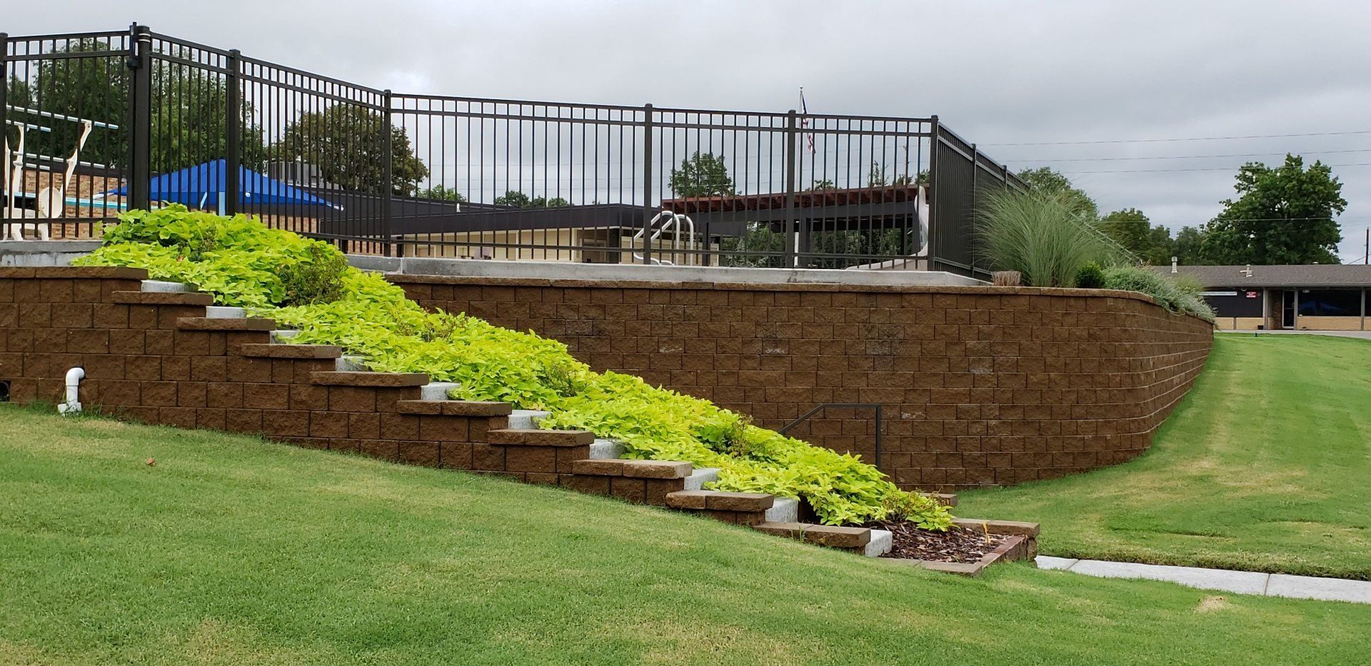 Custom Retaining Walls — Finished Retaining Wall In Progress in Wichita, KS